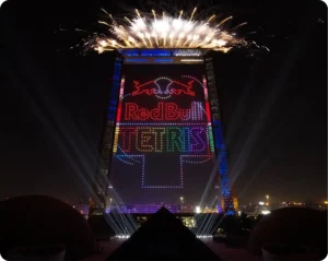 Red Bull Tetris World Final event branding and fireworks on the iconic Dubai Frame at night in the UAE.